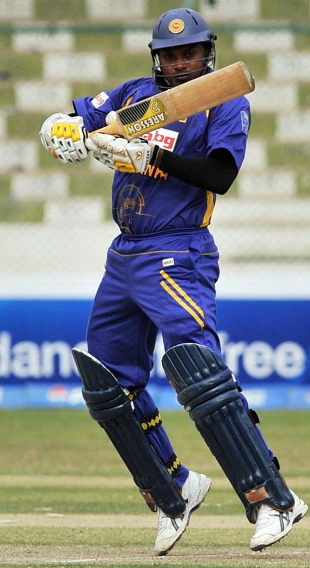 Thilina Kandamby on his toes while attempting a square cut ...