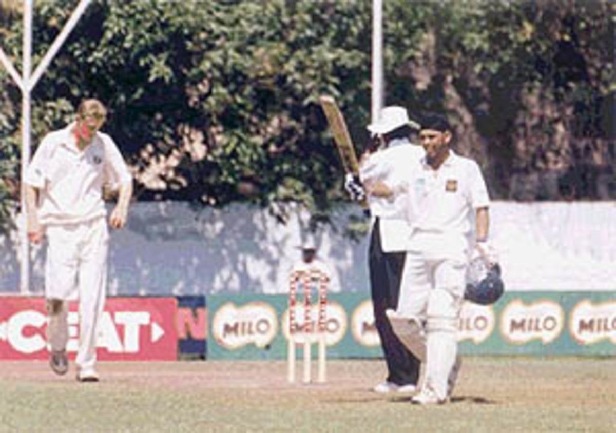 Ravneet Ricky waving his bat after his century, Australia Under-19s v India Under-19s, India U-19 World Cup, 2nd Semi Final, 25 Jan 2000