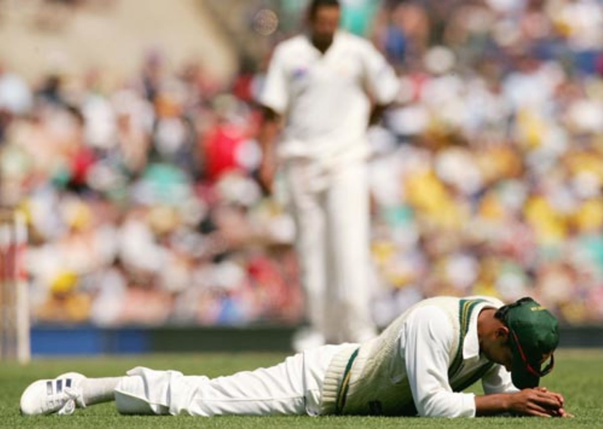 Yousuf Youhana lying on the ground | ESPNcricinfo.com