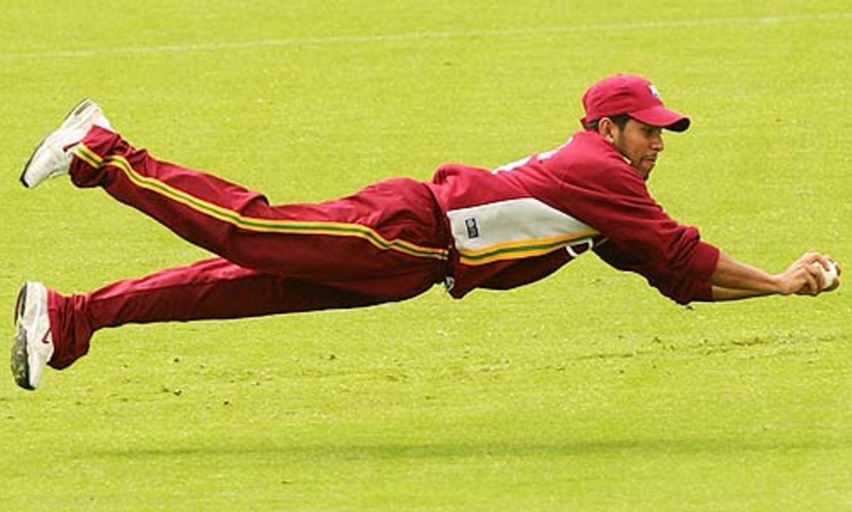 Ramnaresh Sarwan dives full stretch to take a stunning catch, Australia A v West Indians, Hobart, January 8, 2005