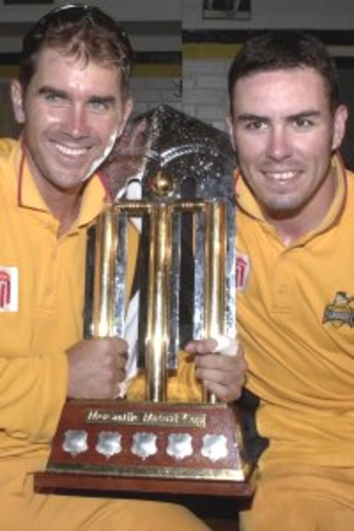 27 Feb 2000: Justin Langer captain of the Western Warriors and team mate Ryan Campbell celebrate after winning the Mercantile Mutual one day cricket final played at the WACA, Perth, Australia. The Warriors won by 45 runs.
