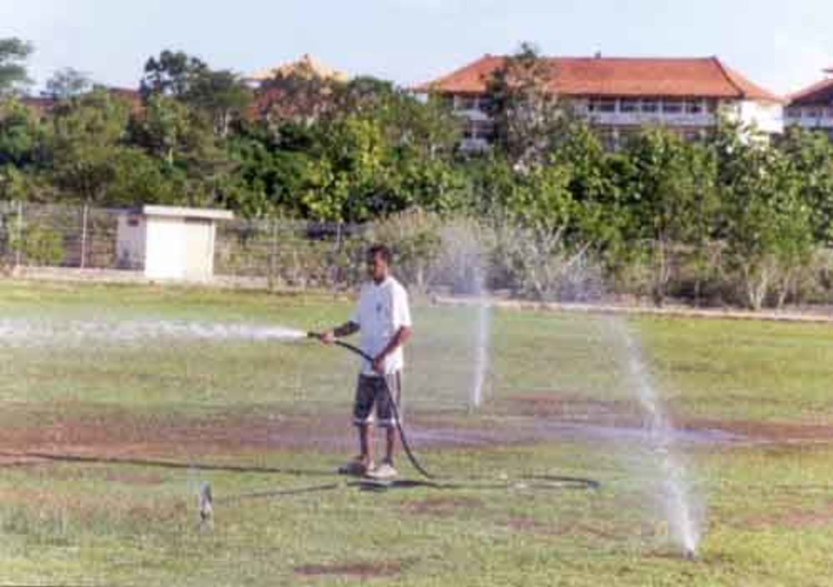 Ground maintenance at Bukit Oval