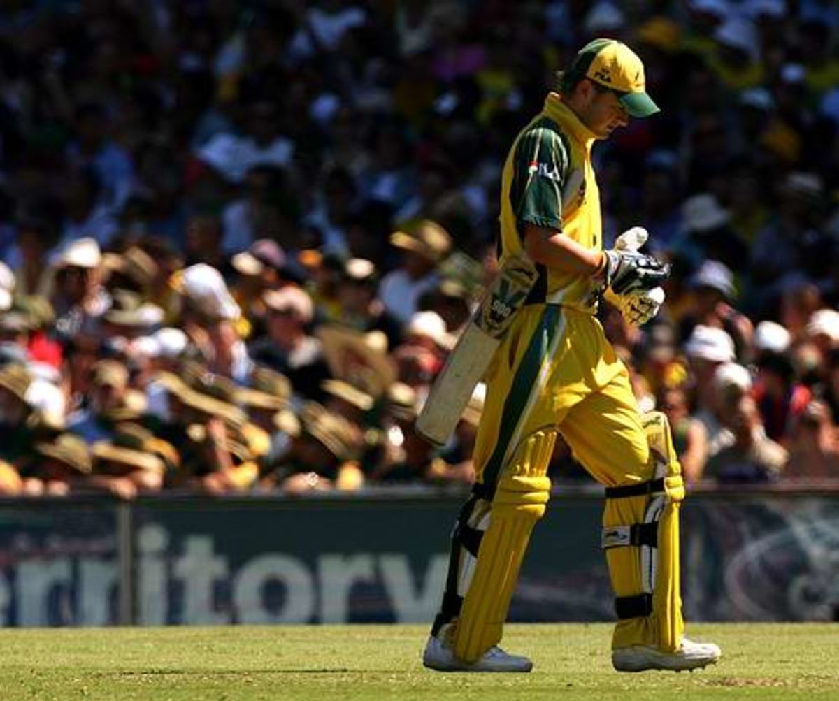 Michael Clarke trudges back after being bowled by Mohammad Hafeez, Australia v Pakistan, VB Series final, Sydney, February 6, 2005