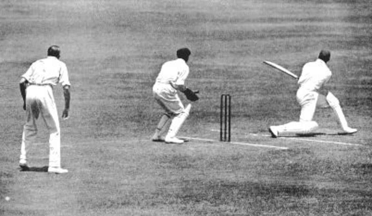 Australia v England, 1924-5. 1st Test, Sutcliffe sweeps Mailey, Oldfield is the keeper, Gregory at slip