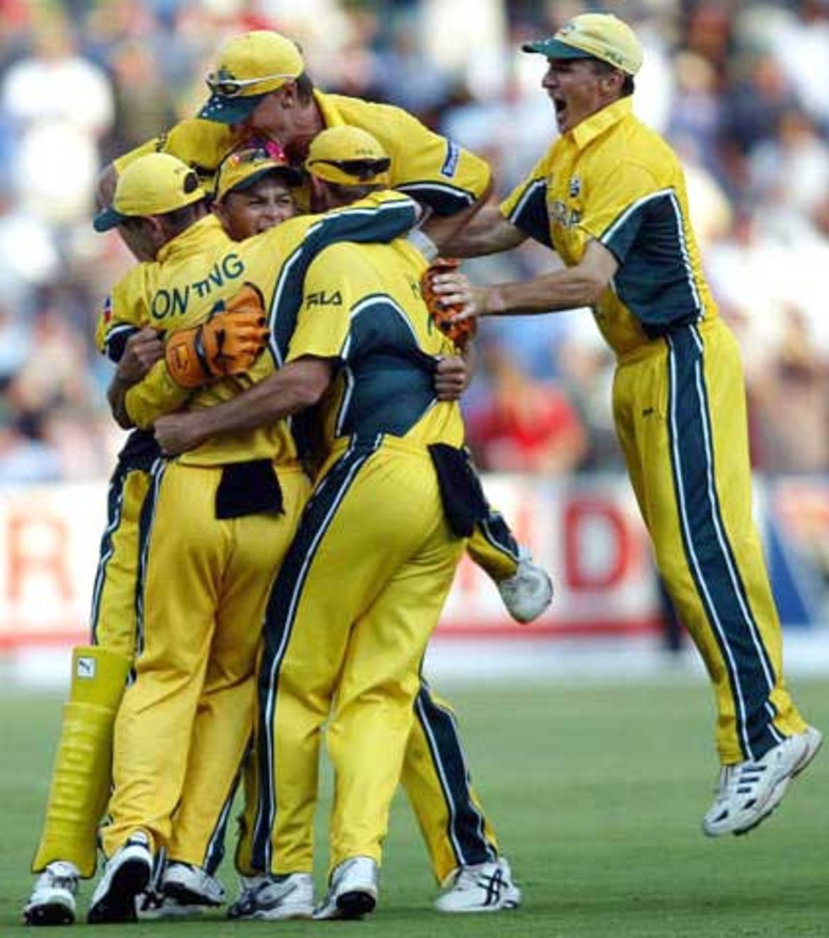 The victorious Australian cricket team poses for photographers with