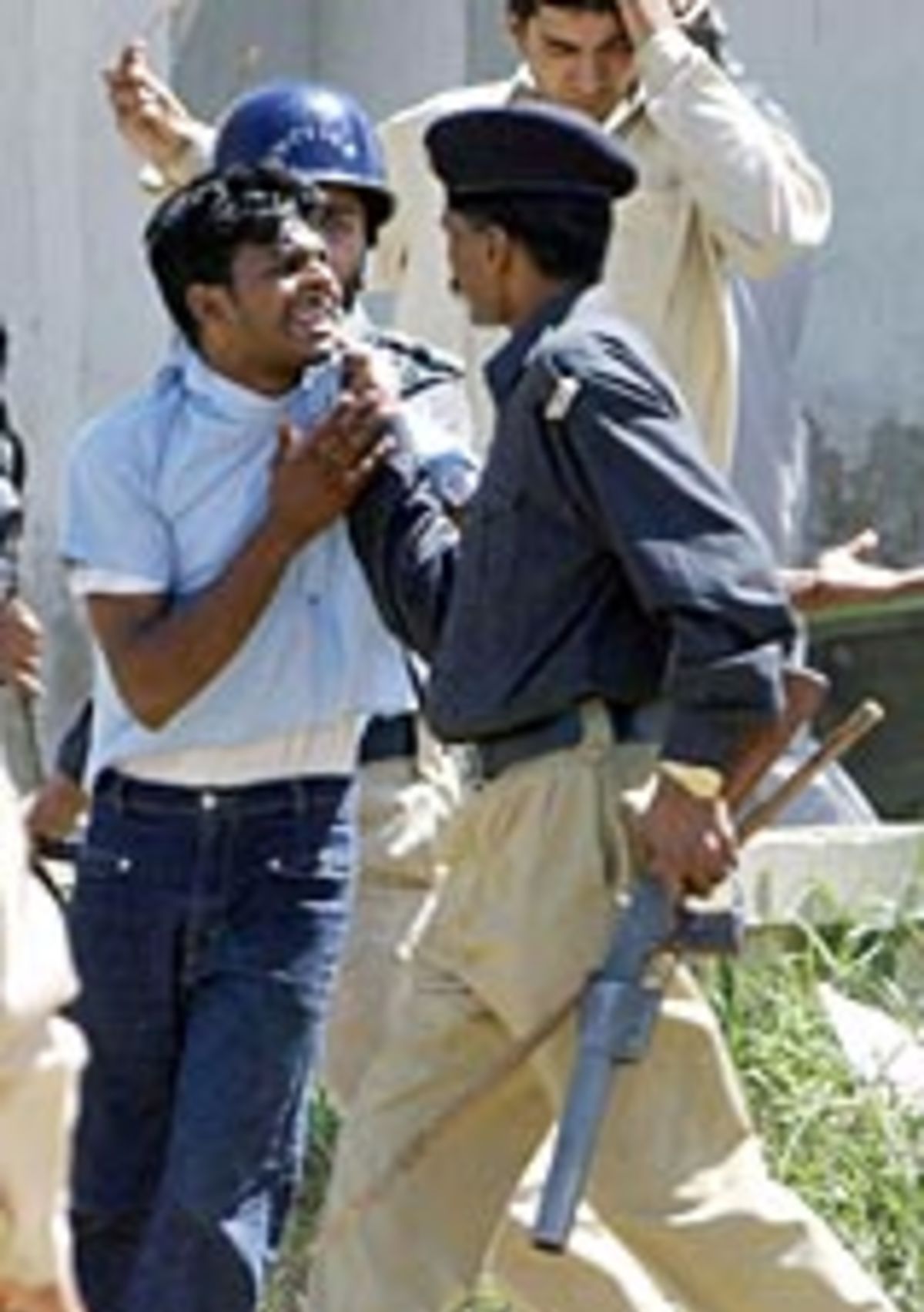 A fan is arrested after police resorted to batoncharging cricket fans