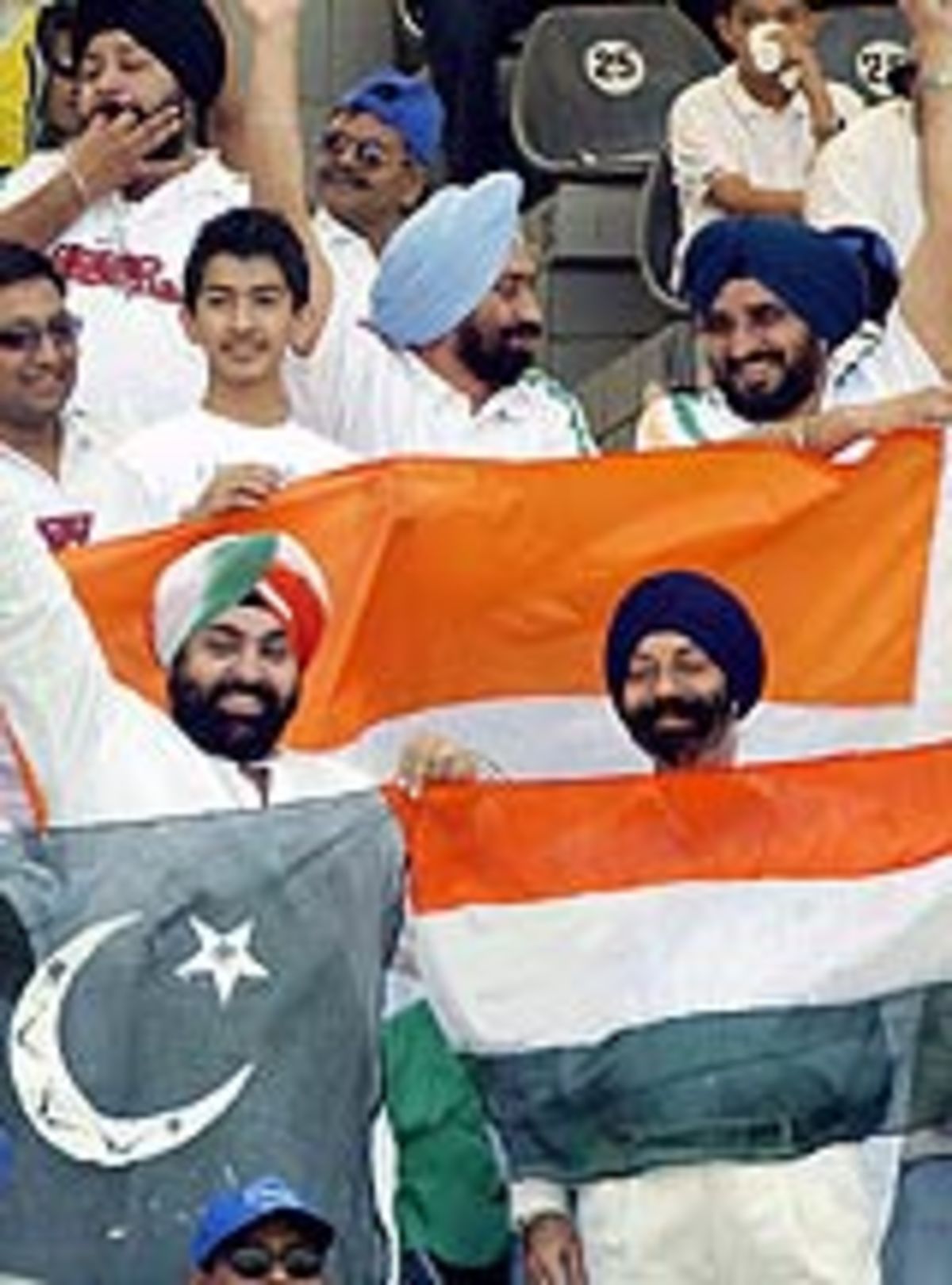 indians-fans-hold-the-flags-of-india-and-pakistan-during-the-final-odi