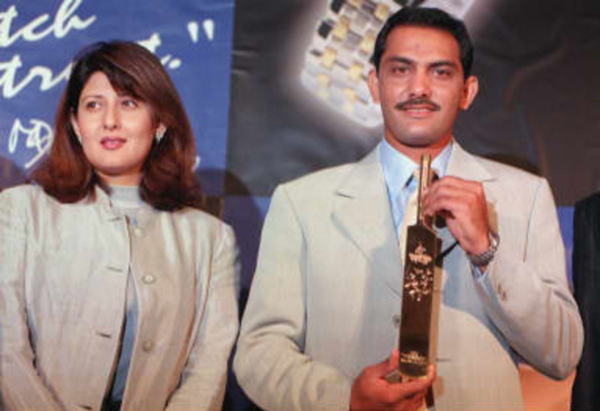 Indian skipper Mohammed Azaruddin with wife Sangeeta,was presented a momento on 21 April 1999 wishing him and the Indian Cricket team good luck for the  World Cup in England. The momento was presented by a Swiss watch manufacturing company, Tissot at a hotel in south Bombay.