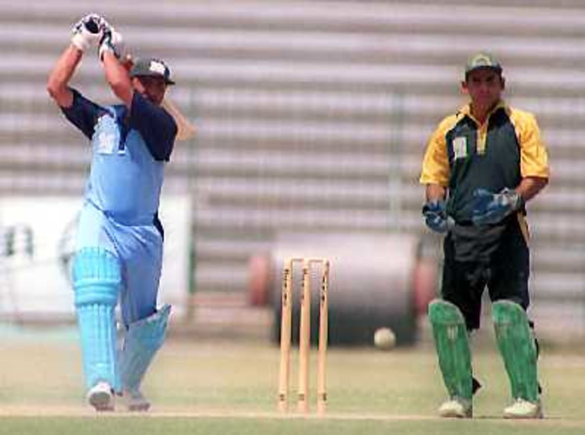 Naseem Khan of Customs who made 45 runs & Tahir Rasheed | ESPNcricinfo.com