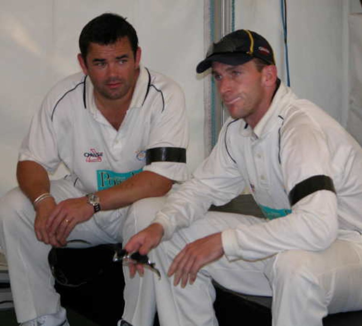 Hampshire captain John Crawley relaxes with former England rugby captain Will Carling