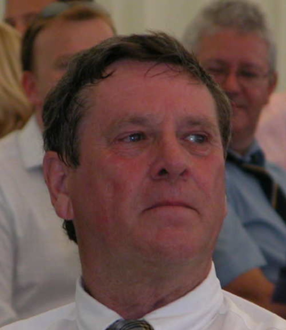 Hmm shall I bid ? Bob Jeavons-Fellows President of Hartley Witney Cricket Club ponders