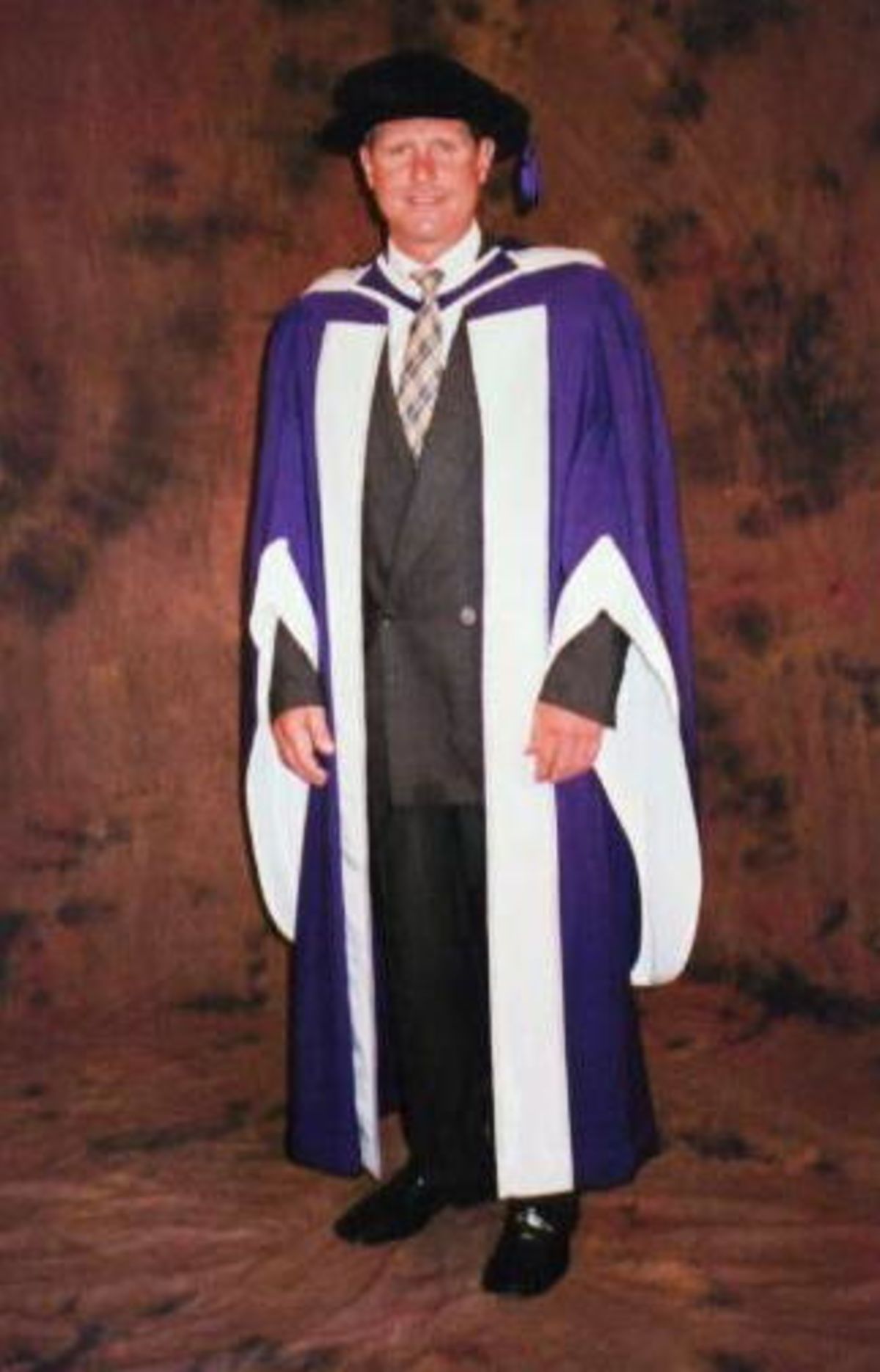 Robin Smith robed for his investiture as Doctor of Letters (hon) at Portsmouth University