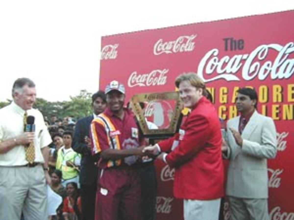 Brian Lara receives the Coca-Cola Singapore Challenge Trophy, India v West Indies (Final), Coca-Cola Singapore Challenge, 1999-2000, Kallang Ground, Singapore, 8 Sep 1999.