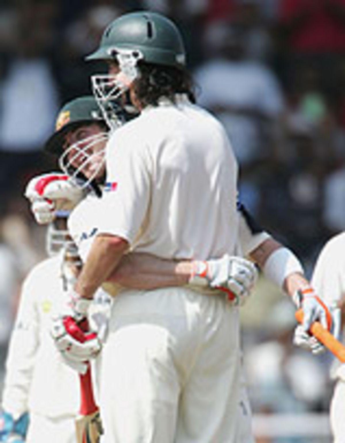 Jason Gillespie and Damien Martyn hug