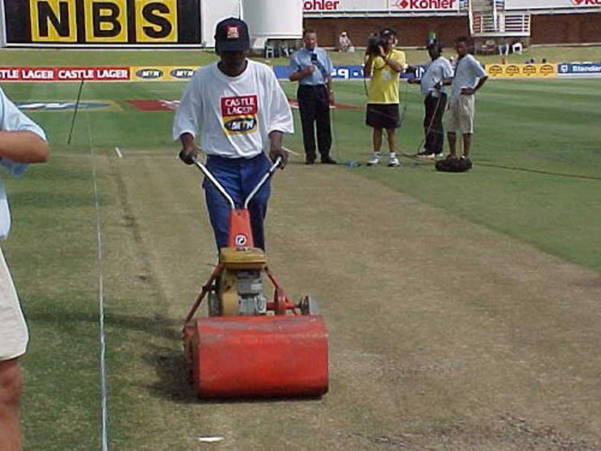 The groundsman at Port Elizabeth prepares the pitch before the start of play of the third day of the Second Test between England and South Africa (11 December 1999).