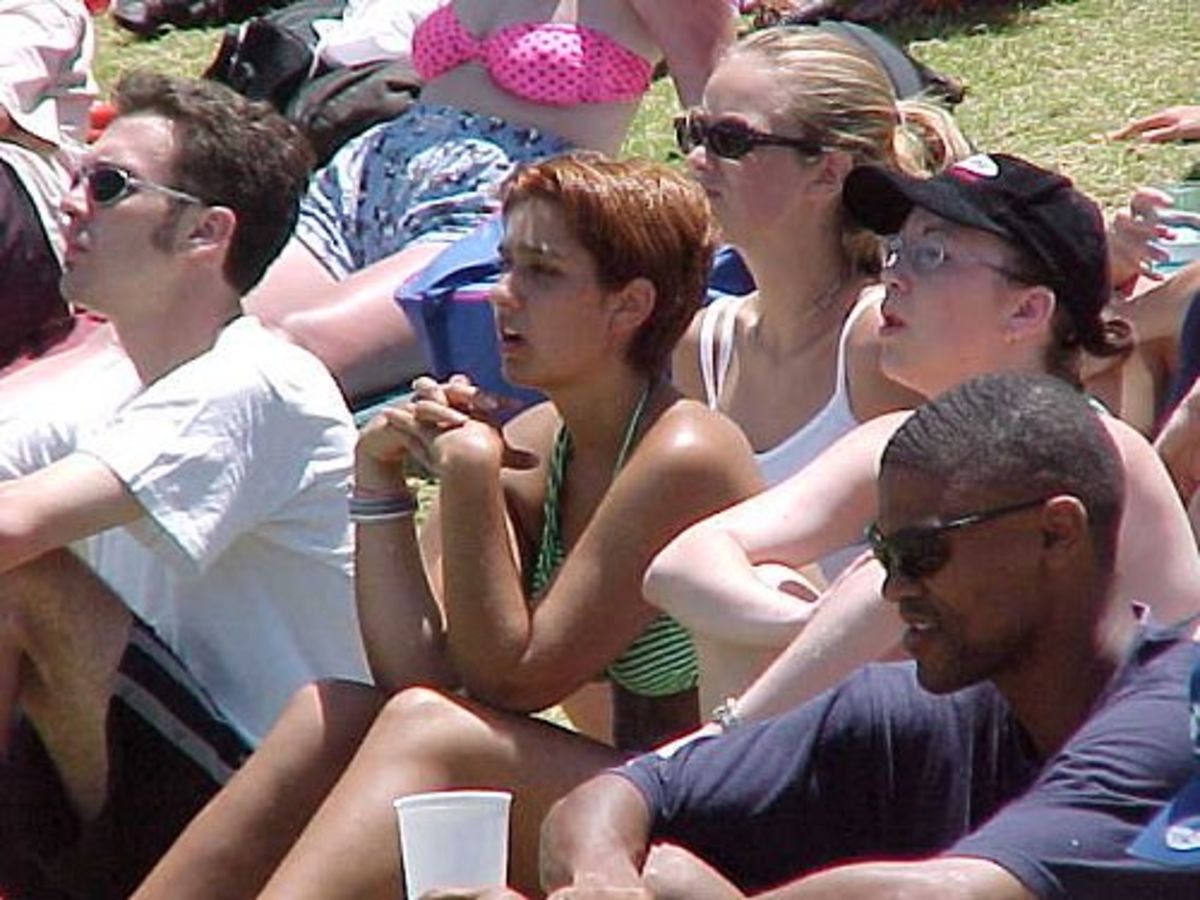 Supporters closely following events on the fourth day of the Port Elizabeth Test match.