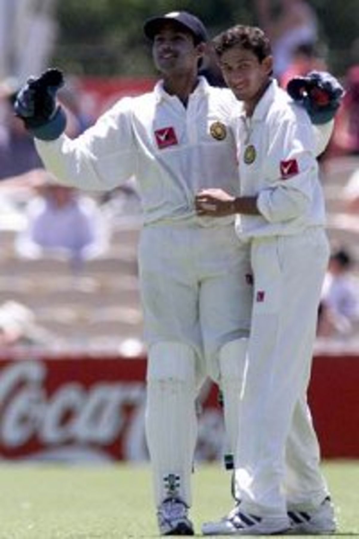 13 Dec 1999: MSK Prasad and Agit Agarkar of India celebrate after Prasad caught Steve Waugh of Australia off the bowling of Agarkar for five, on day four of the first test between Australia and India, at the Adelaide Oval, Adelaide, Australia.