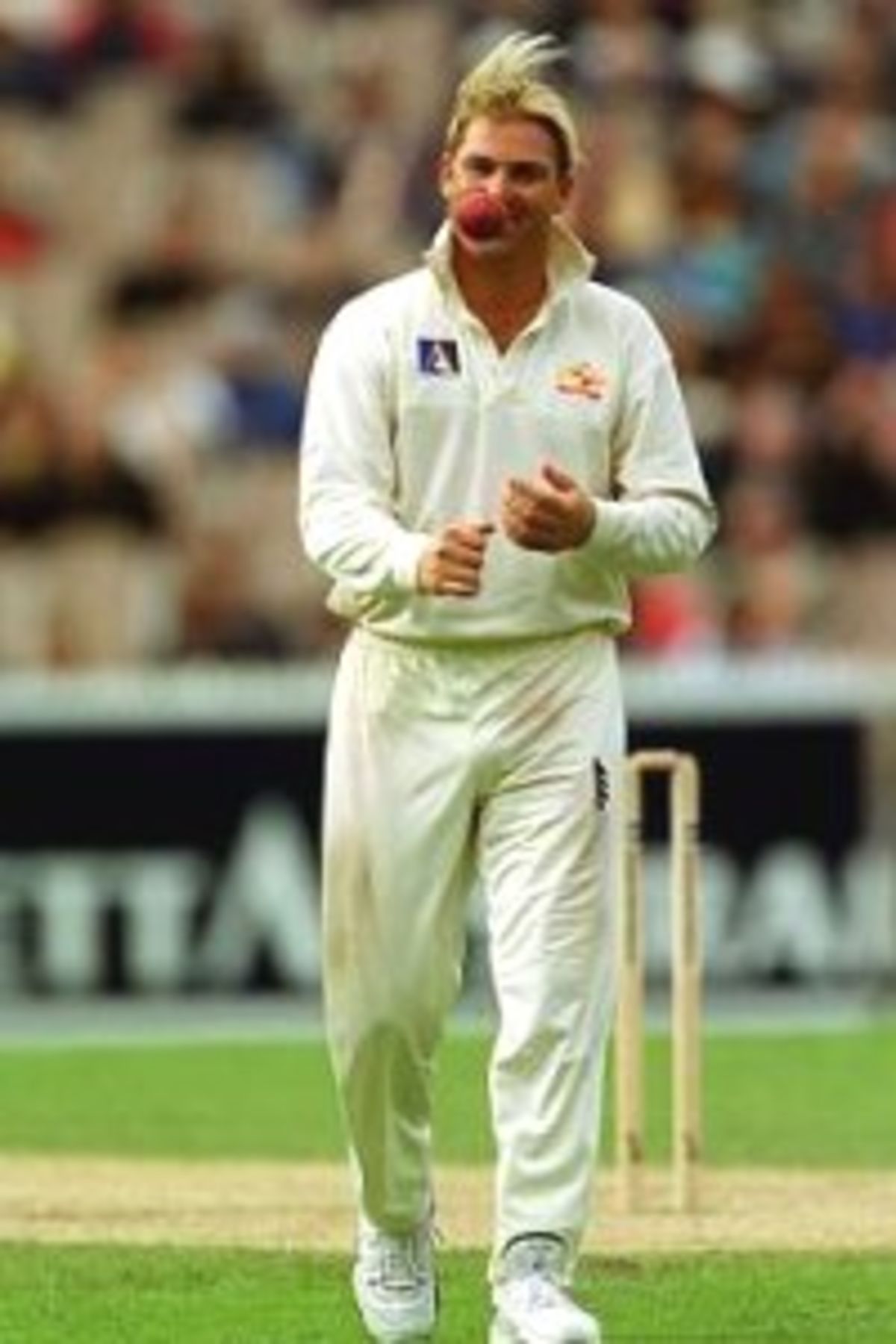 28 Dec 1999: Shane Warne of Australia laughs as the Indian fans taunt him, on day three of the second test match between Australia and India, played at the Melbourne Cricket Ground, Melbourne, Australia. India finished the day at nine for 235 runs.
