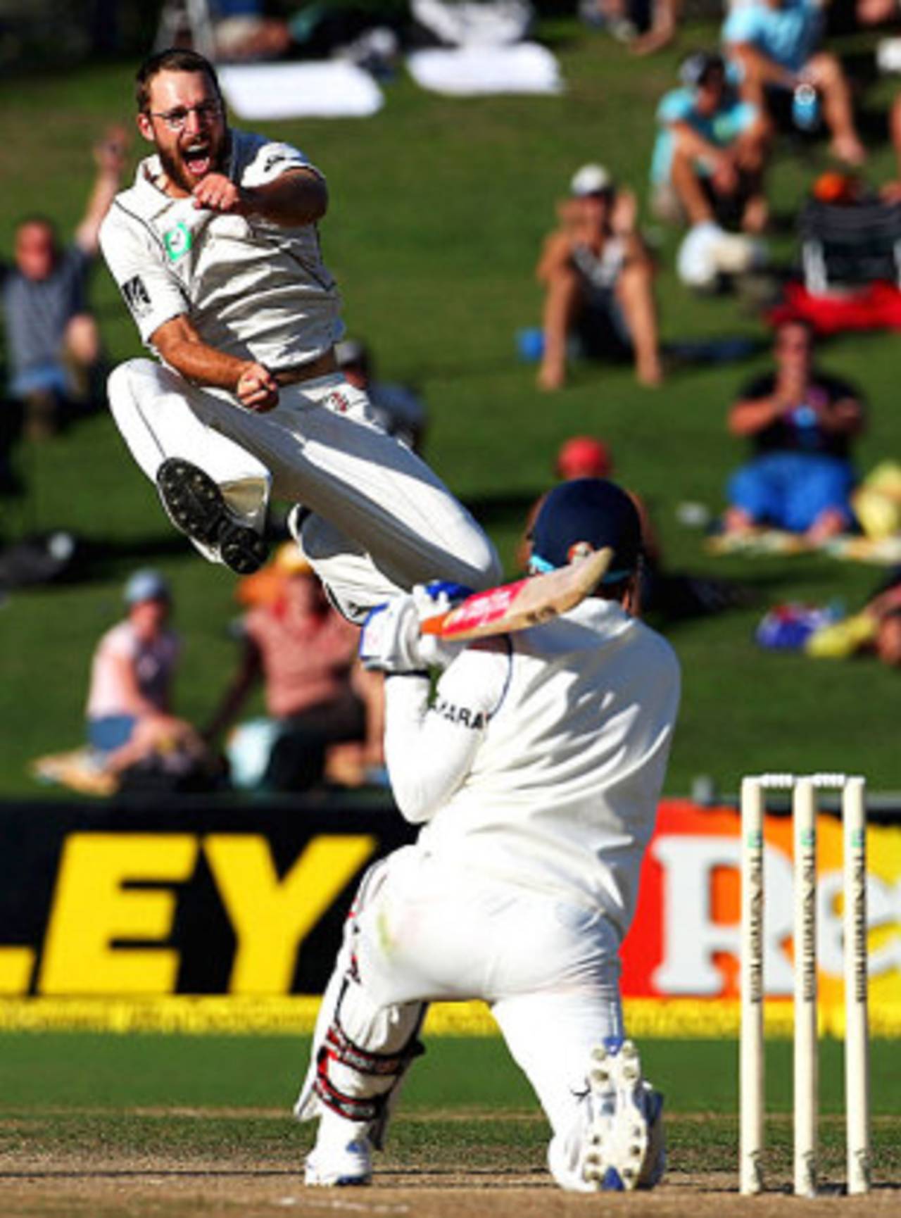 Daniel Vettori is airborne after getting Virender Sehwag to nick one, New Zealand v India, 2nd Test, Napier, 2nd day, March 27, 2009