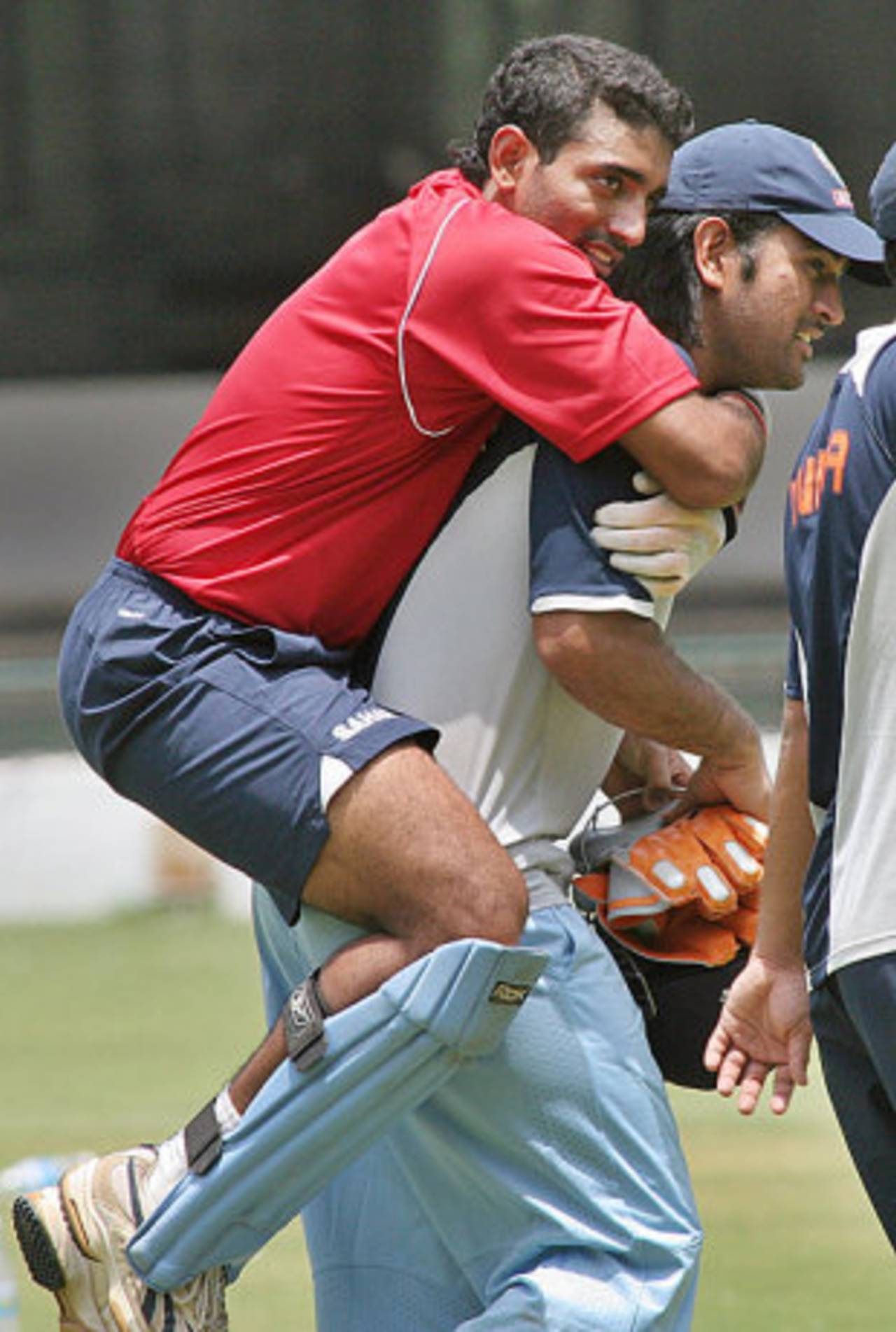 MS Dhoni carries Robin Uthappa on his back, Bangalore, June 14, 2007