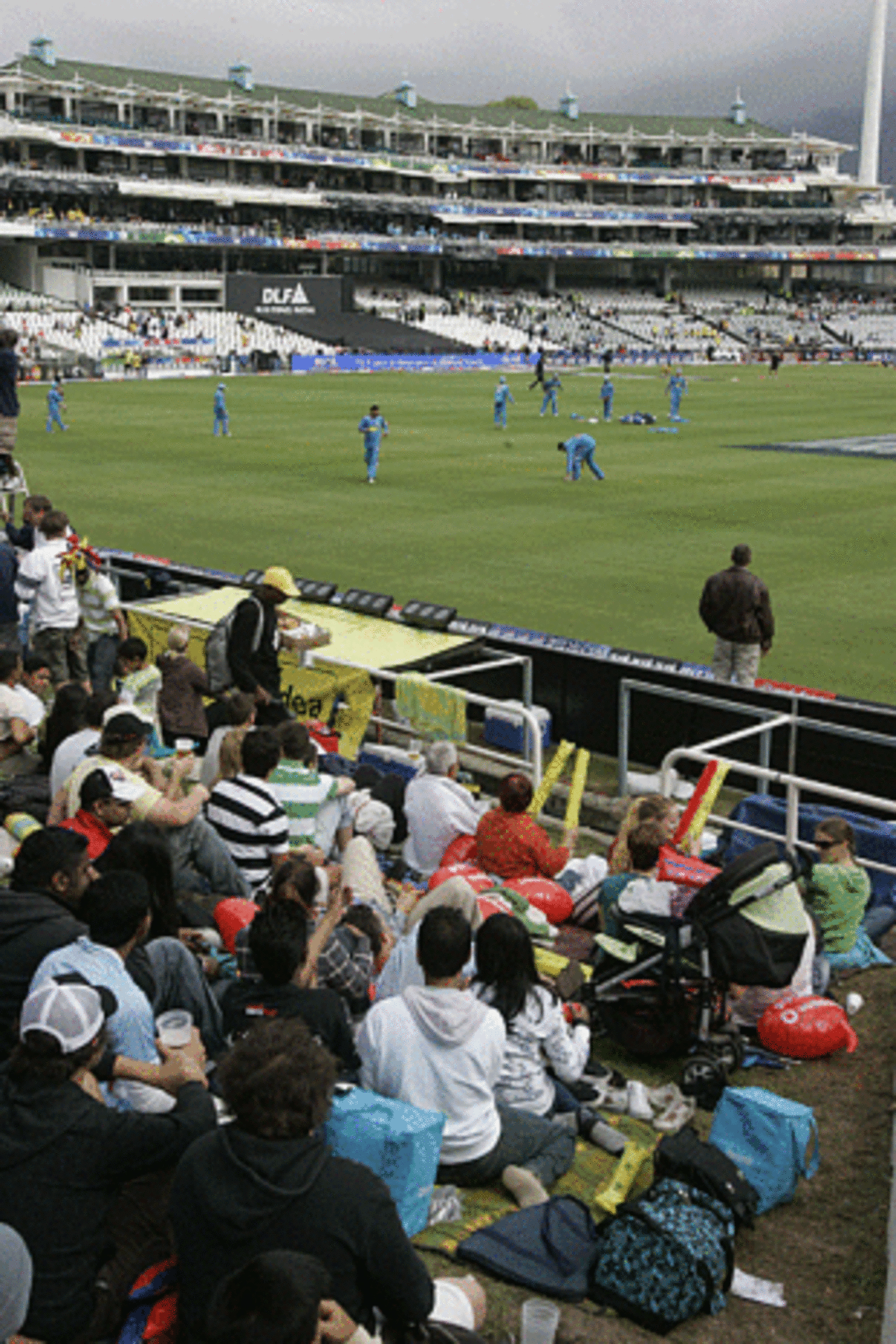 The crowd watches Mumbai Indians warm up ahead of their first game, Chennai Super Kings v Mumbai Indians, IPL, 1st game, Cape Town, April 18, 2009