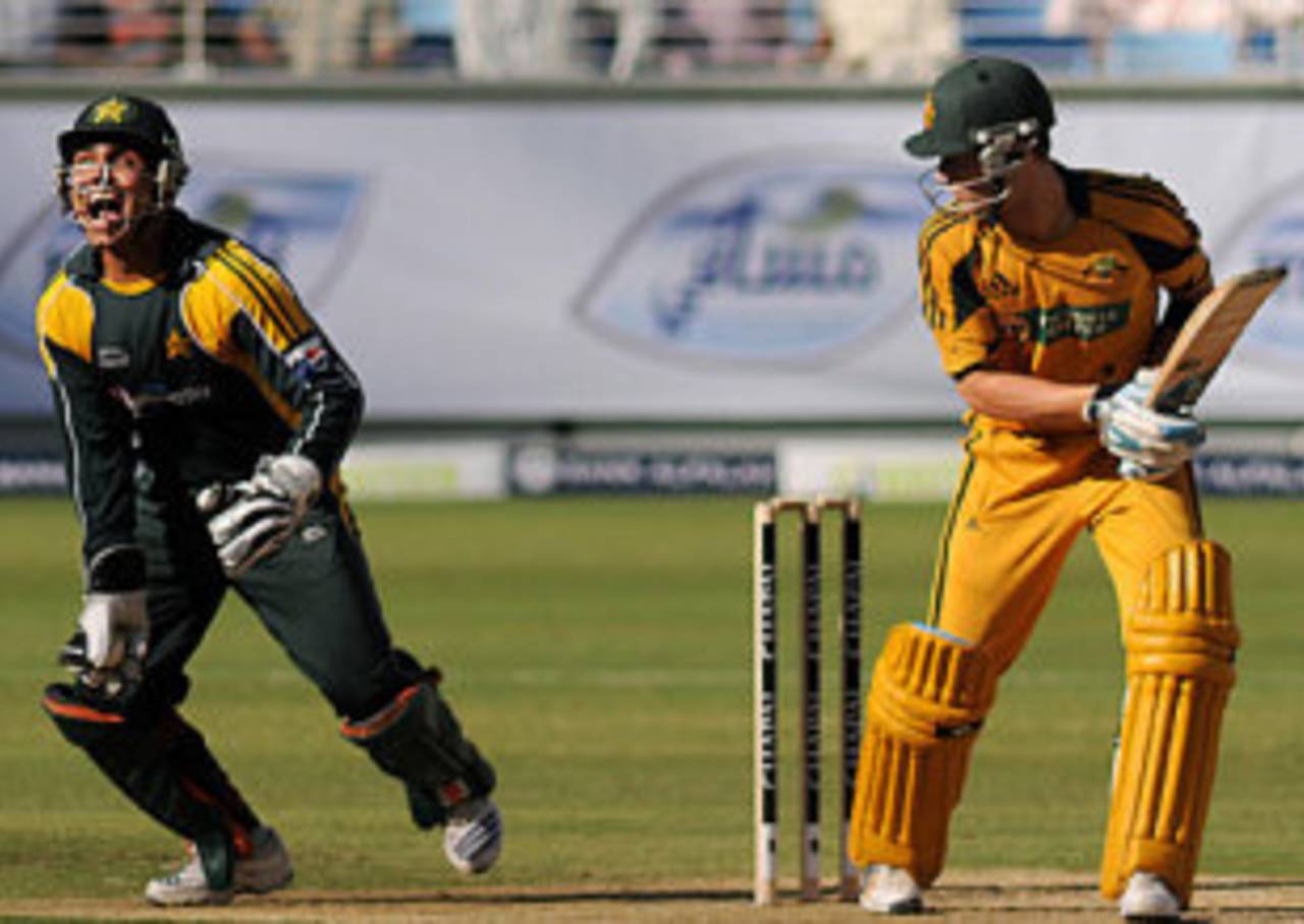 Kamran Akmal takes the edge to get rid of the struggling Michael Clarke, Pakistan v Australia, 1st ODI, Dubai, April 22, 2009