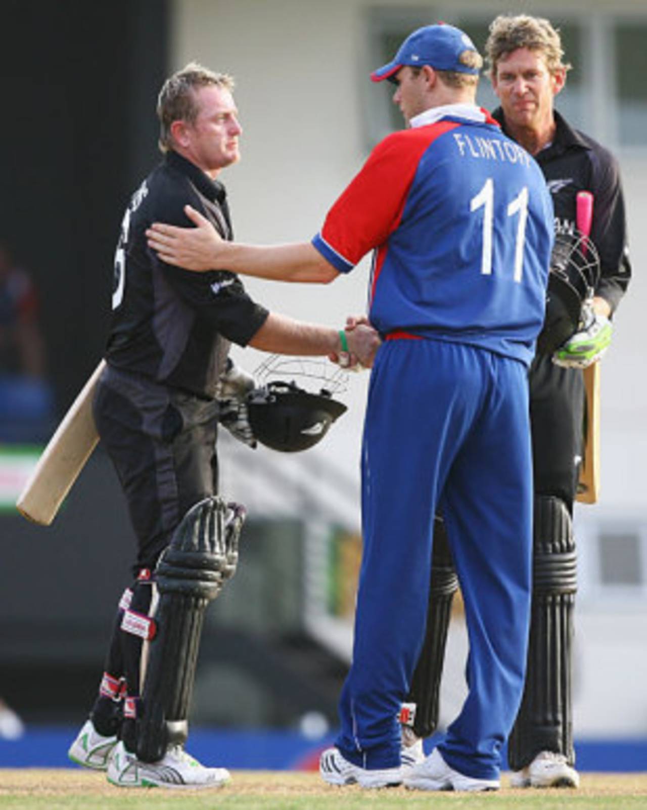 Andrew Flintoff congratulates Jacob Oram and Scott Styris on New Zealand's win, England v New Zealand, Group C, St Lucia, March 16, 2007