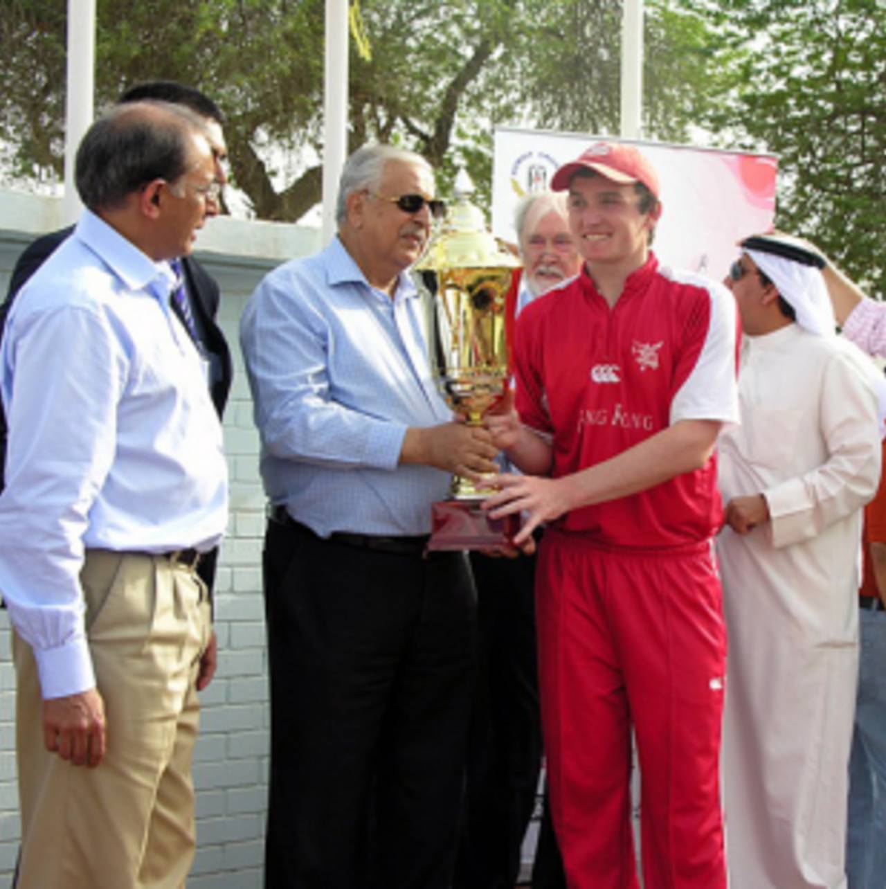 James Atkinson, captain and Man of the Match, accepts the trophy after Hong Kong beat Afghanistan&nbsp;&nbsp;&bull;&nbsp;&nbsp;Kuwait Cricket