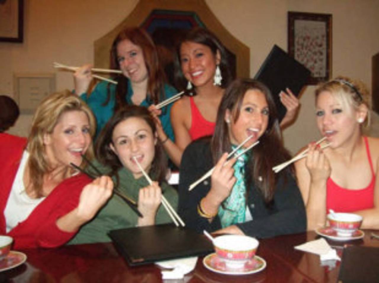 Members of Royal Challengers Bangalore's Mischief Gal cheerleader squad have a meal