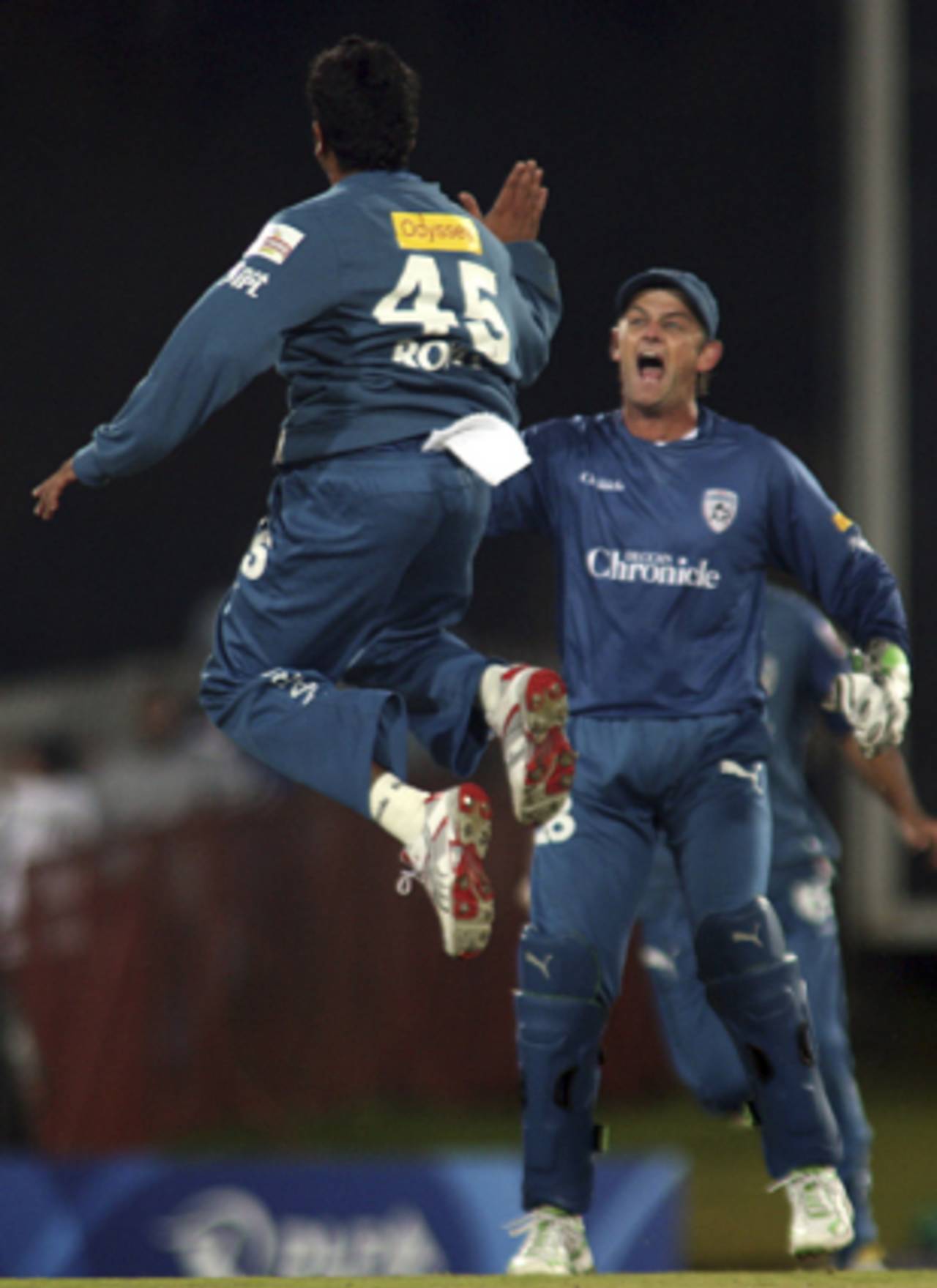 Rohit Sharma celebrates his hat-trick with Adam Gilchrist, Deccan Chargers v Mumbai Indians, IPL, 32nd match, Centurion, May 6, 2009