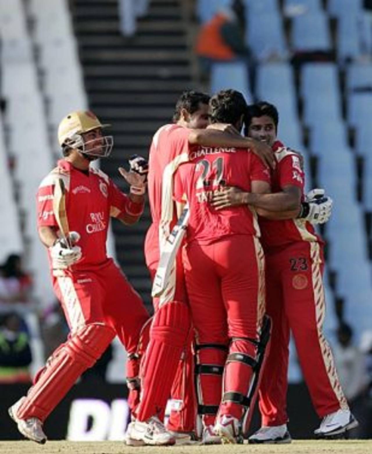 Ross Taylor is mobbed by his team-mates after leading his team to a tense win, Kolkata Knight Riders v Royal Challengers Bangalore, IPL, Centurion, May 12, 2009