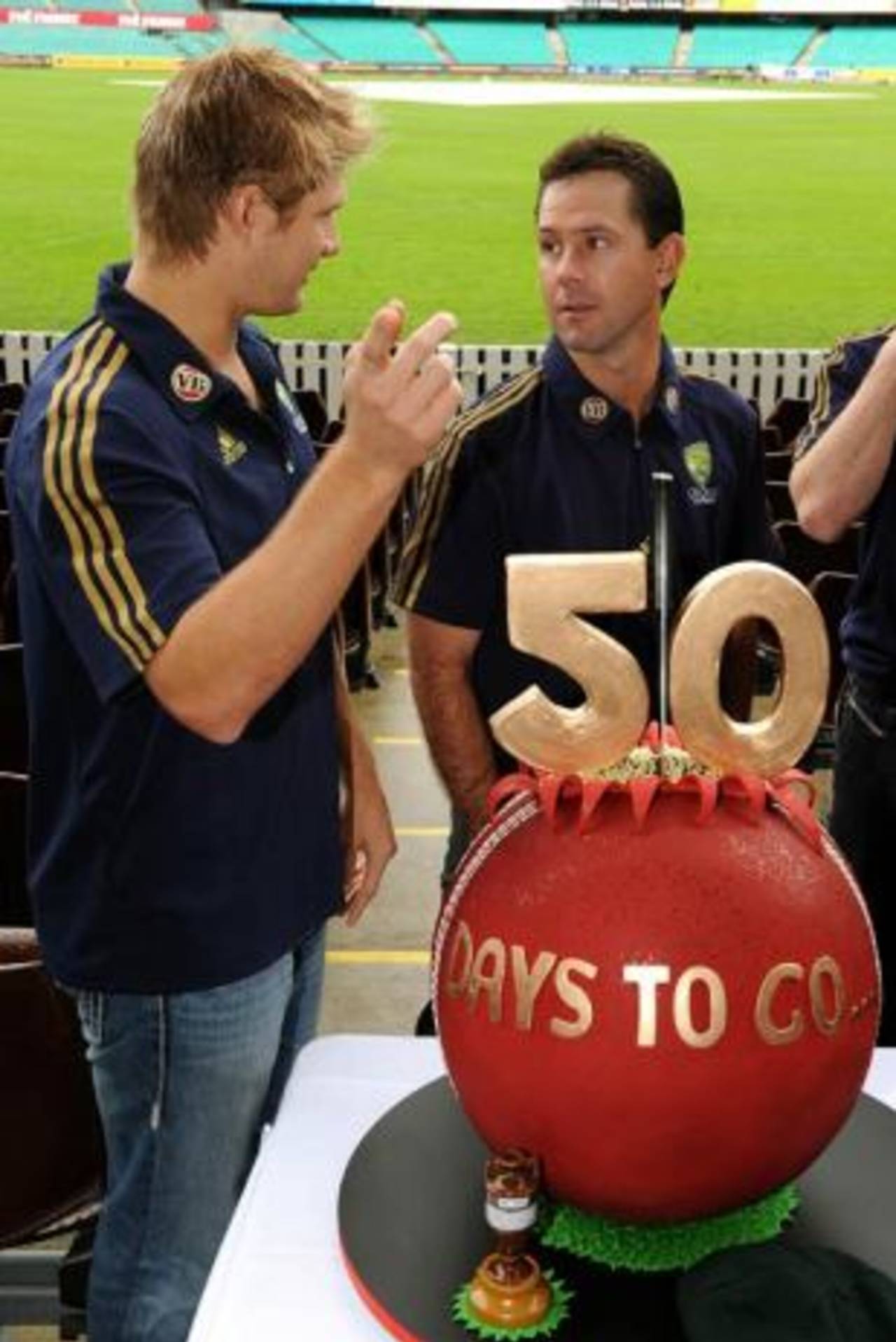 Shane Watson and Ricky Ponting pose with a '50 days to go for the Ashes' cake, Sydney, May 20, 2009