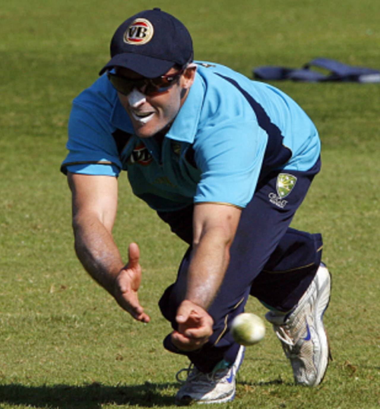 Michael Hussey gets busy during a fielding drill, Nottingham, May 31, 2009
