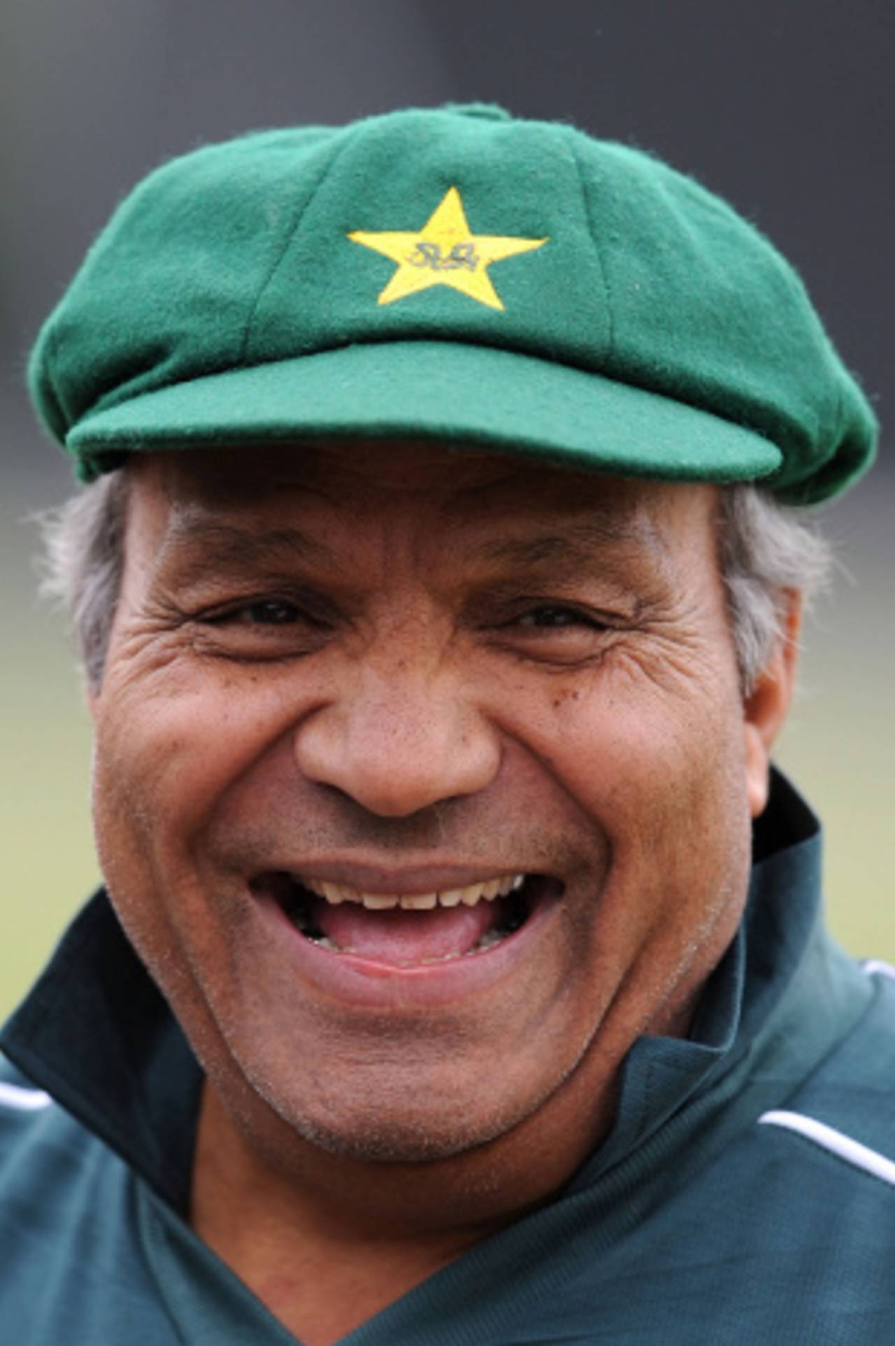 A cheerful Intikhab Alam looks on during a training session, London, June 5, 2009