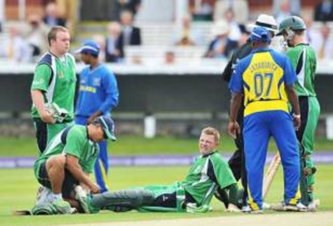 Niall O'Brien receives treatment after hurting his ankle, Ireland v Sri Lanka, ICC World Twenty20, Lord's, June 14, 2009