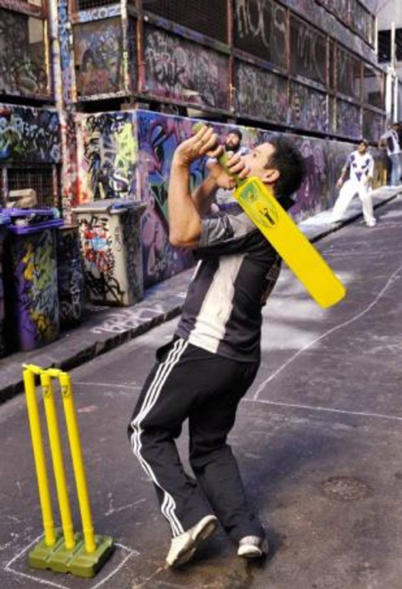 Brad Hodge bats during a game of laneway cricket, Melbourne, June 19, 2009