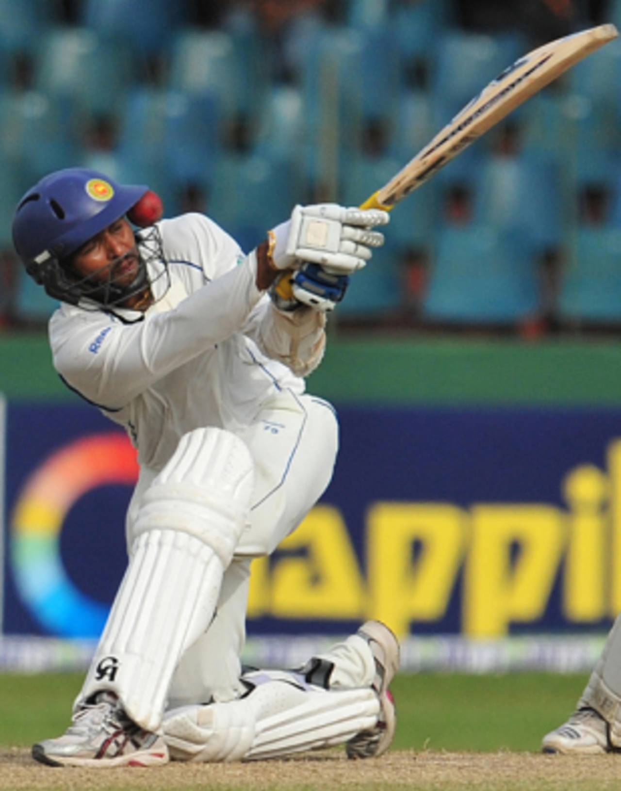The ball sneaks through Tillakaratne Dilshan's helmet grill as he top-edges a sweep, Sri Lanka v Pakistan, 3rd Test, 2nd day, Colombo, July 21, 2009 