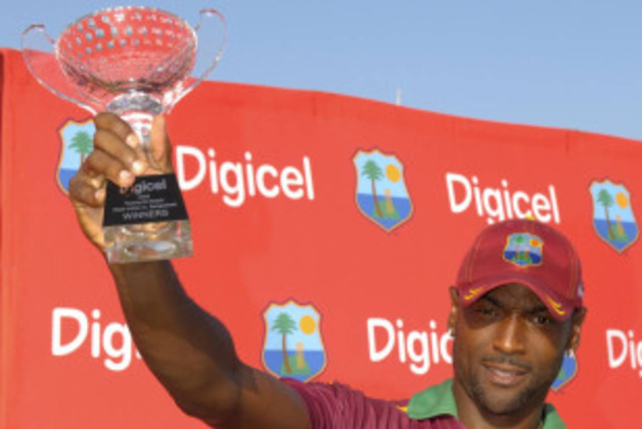 Floyd Reifer holds aloft the winners' trophy after West Indies beat Bangladesh by five wickets in St Kitts&nbsp;&nbsp;&bull;&nbsp;&nbsp;DigicelCricket.com