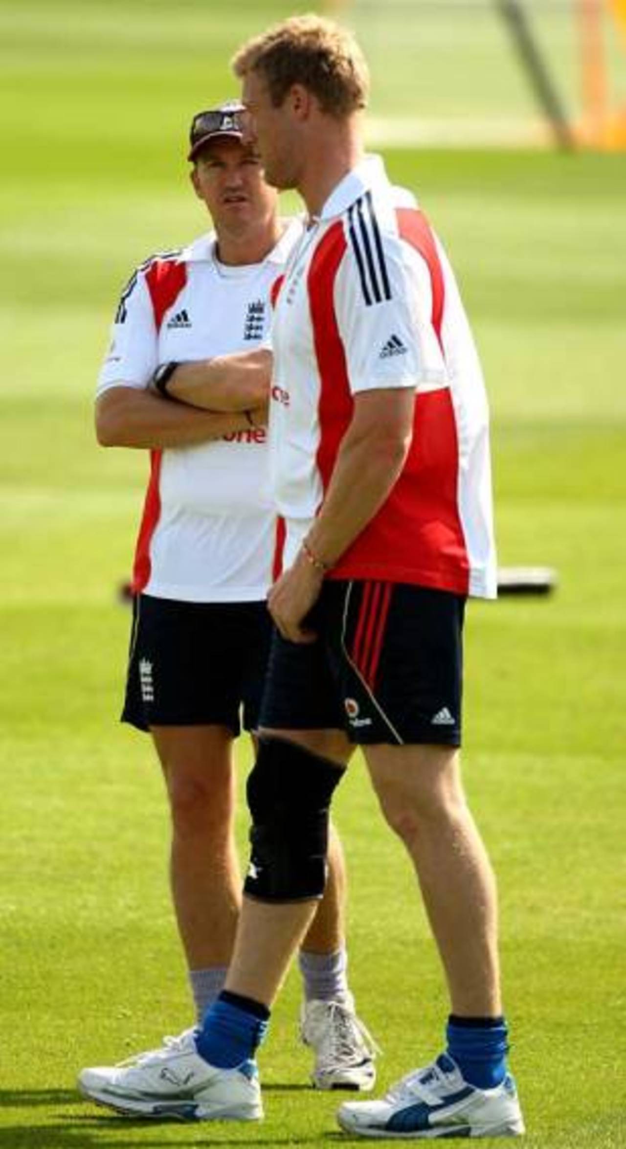 Andy Flower chats with Andrew Flintoff during training, Headingley, August 6, 2009
