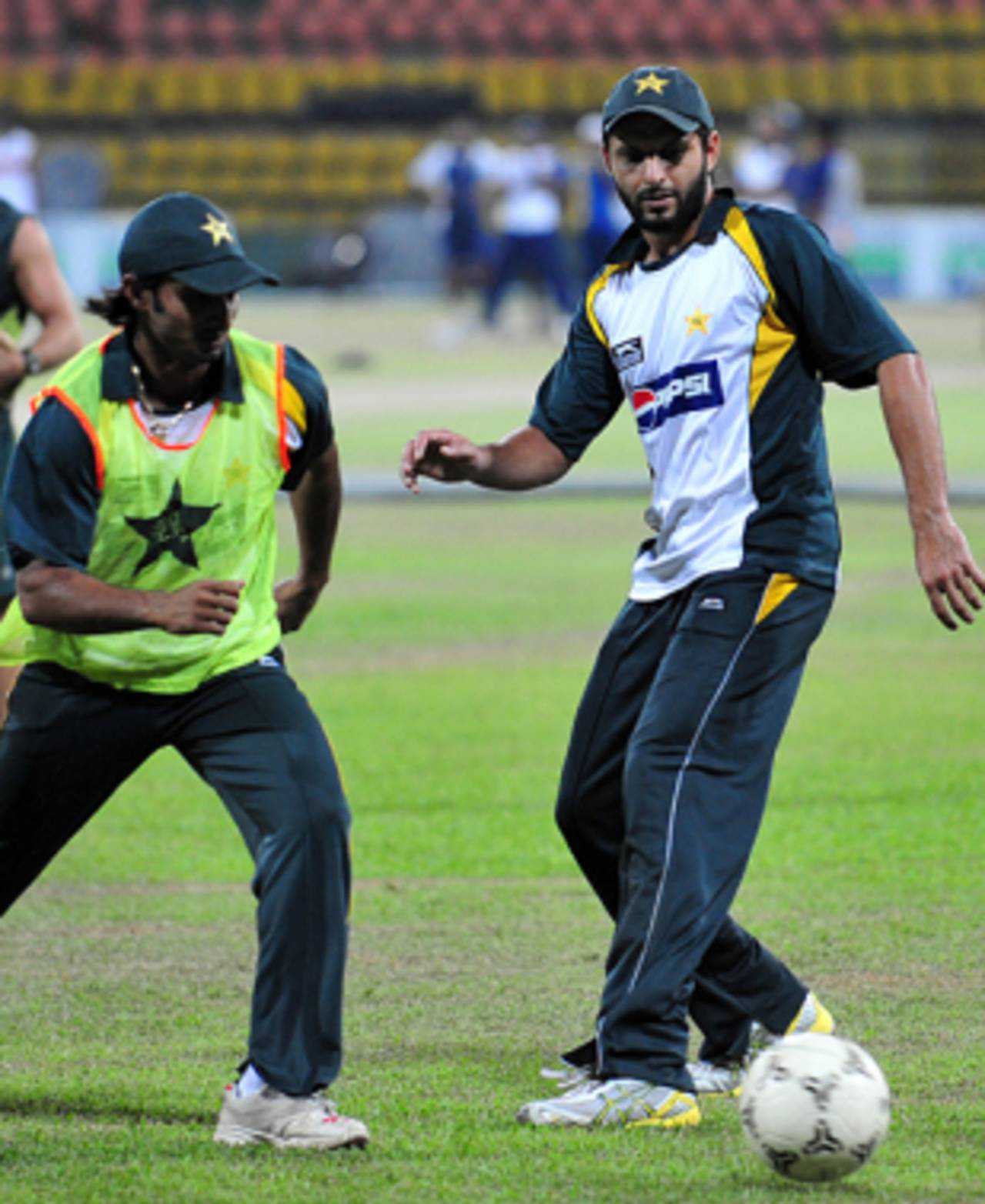 Imran Nazir and Shahid Afridi display their footballing skills, Colombo, August 11, 2009