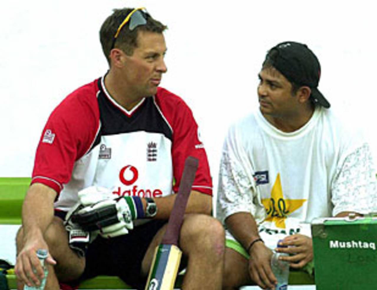 Marcus Trescothick and Mushtaq Ahmed chat during a training session, Karachi, October 23, 2000