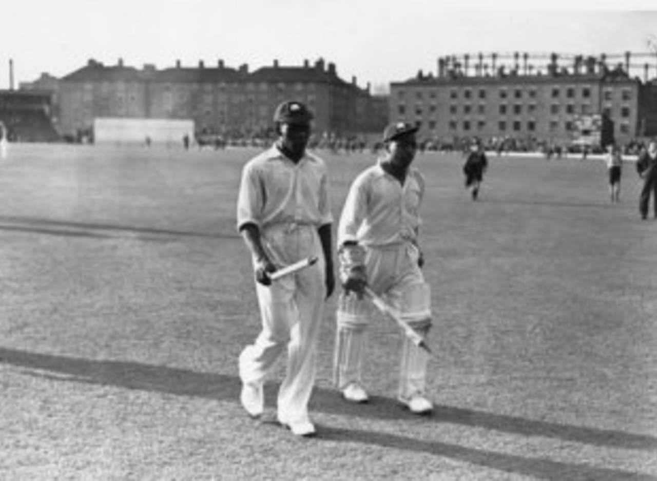 Manny Martindale and Derek Sealy leave the field at the end of the Oval Test&nbsp;&nbsp;&bull;&nbsp;&nbsp;Getty Images