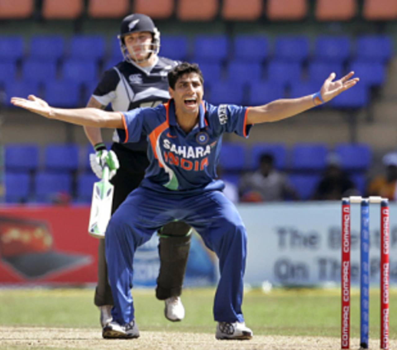 Ashish Nehra successfully appeals for an lbw against Brendon McCullum, India v New Zealand, 2nd match, Compaq Cup, Colombo, September 11, 2009