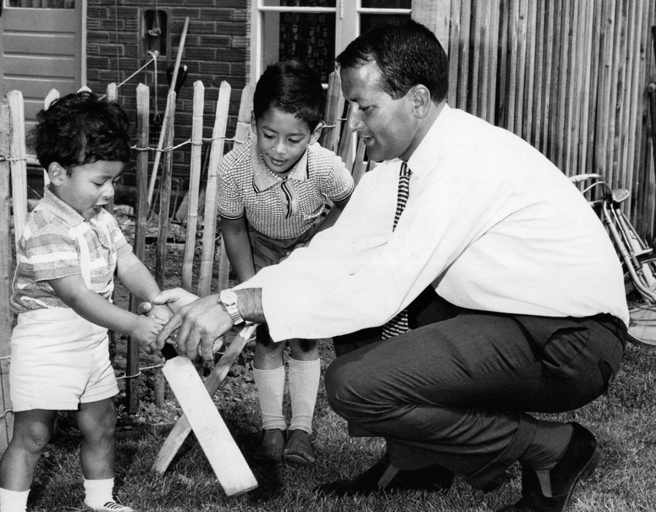 Basil D'Oliveira plays with his children, 1968