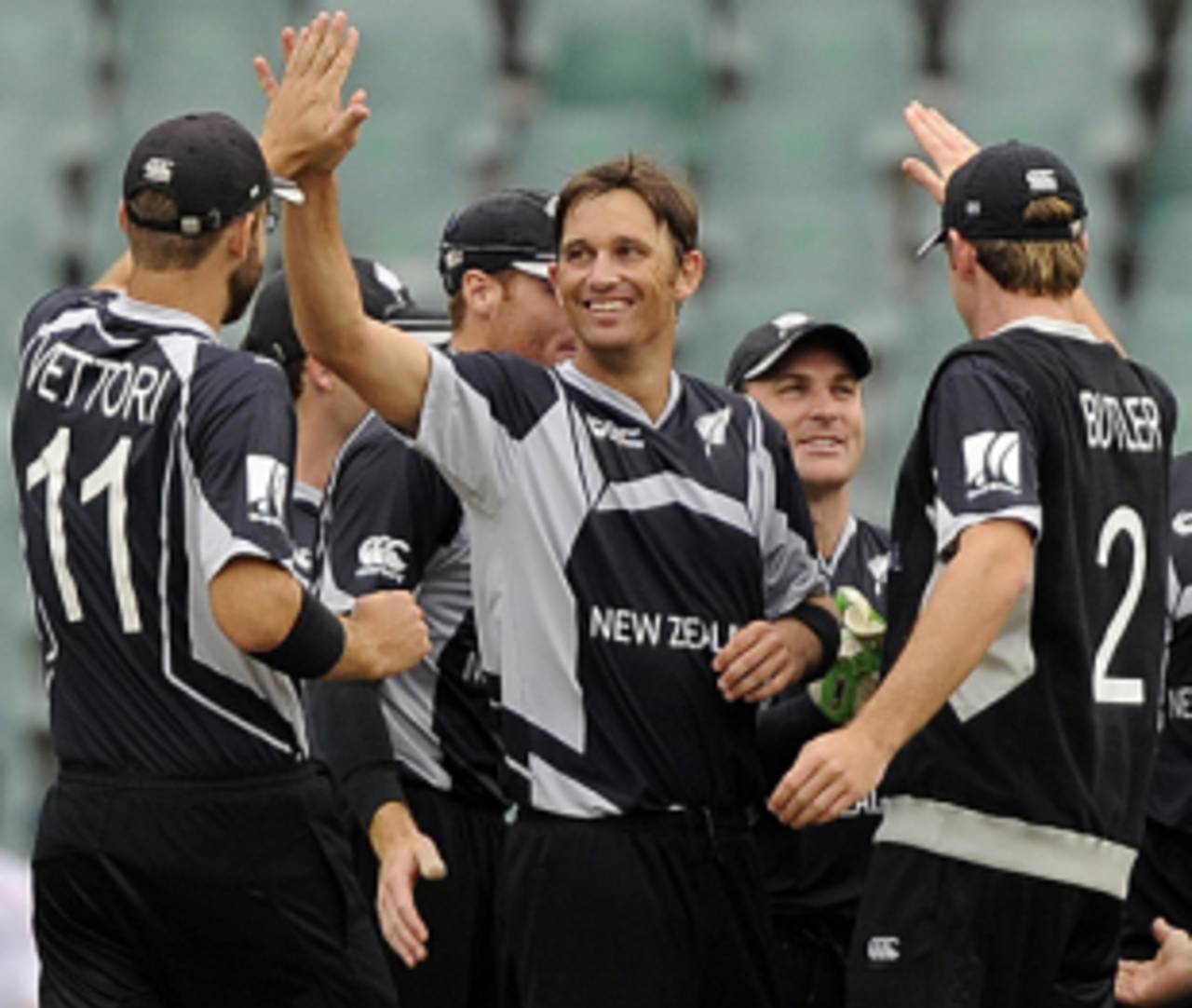 Shane Bond gets the high fives after accounting for Owais Shah, England v New Zealand, ICC Champions Trophy, Group B, Johannesburg, September 29, 2009