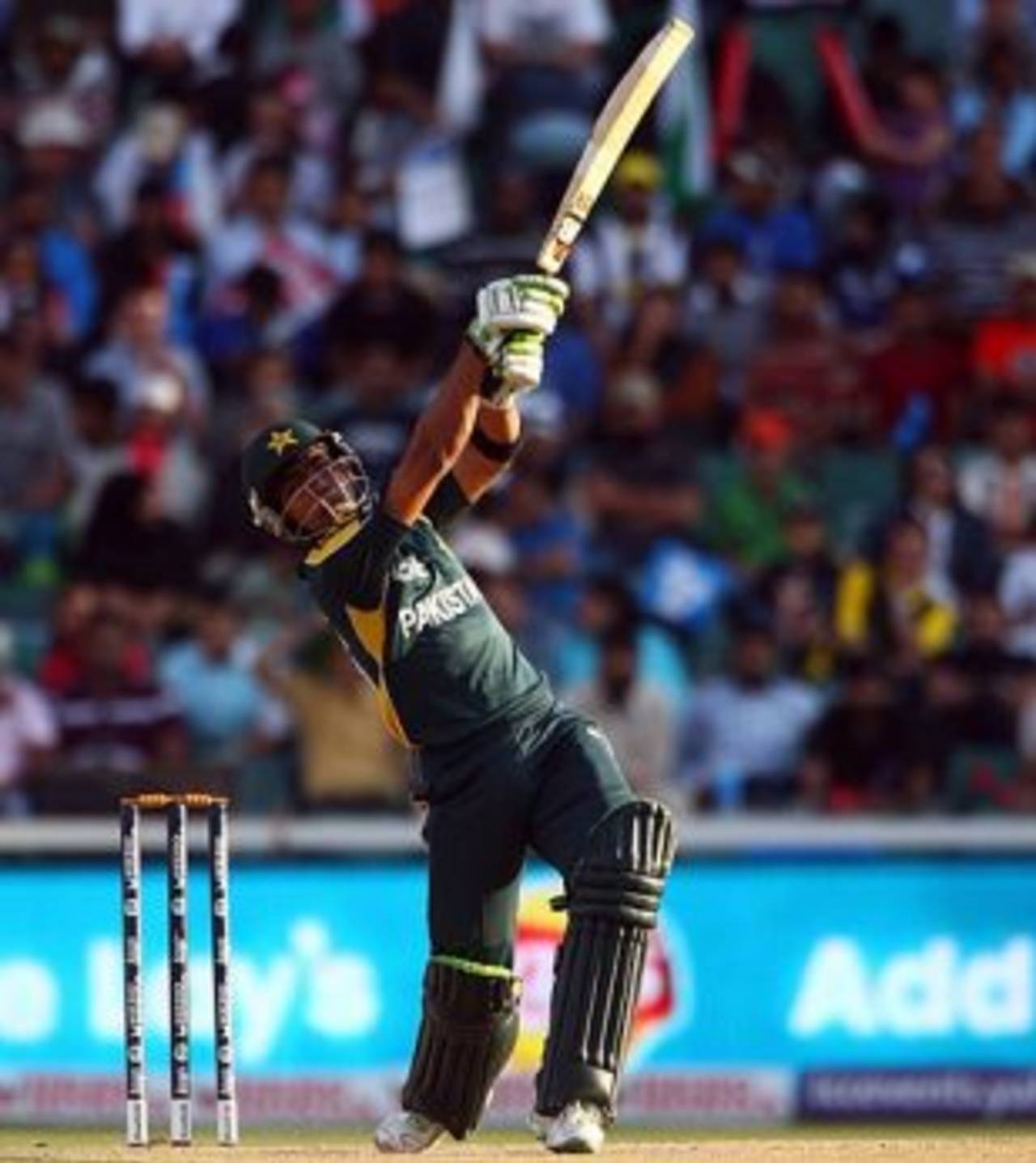 Umar Akmal lofts down the ground, New Zealand v Pakistan, ICC Champions Trophy, 2nd semi-final, Johannesburg, October 3, 2009
