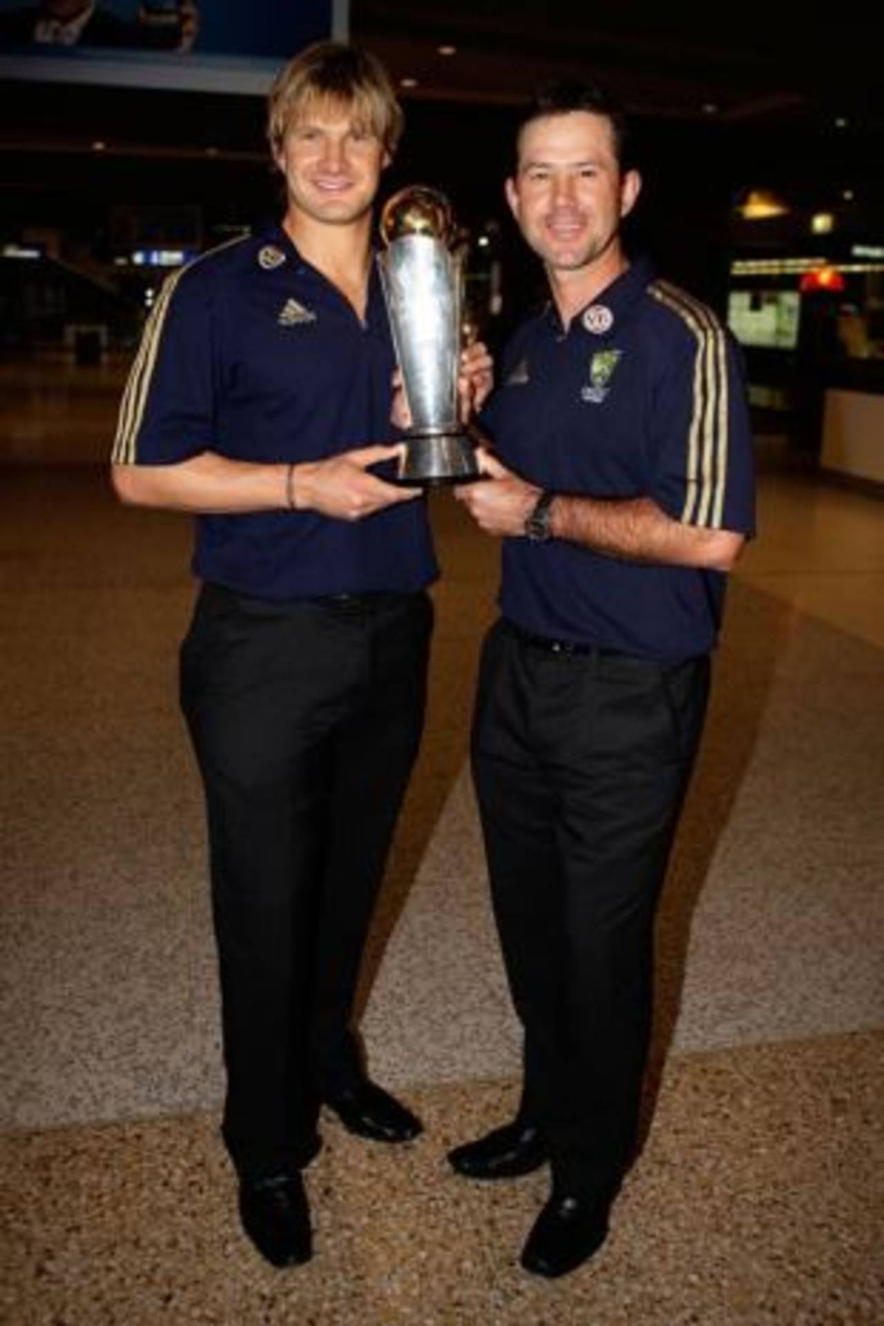 Shane Watson and Ricky Ponting with the Champions Trophy after arriving home to Sydney&nbsp;&nbsp;&bull;&nbsp;&nbsp;Getty Images