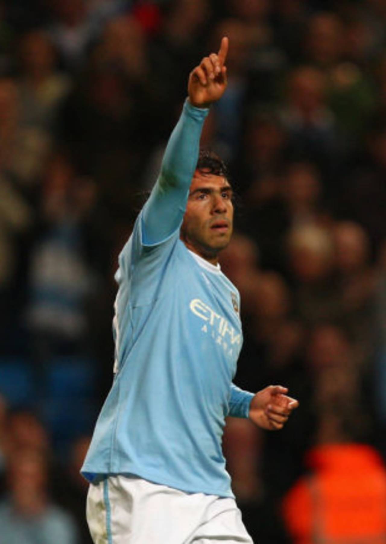 Carlos Tevez of Manchester City celebrates, September 28, 2009