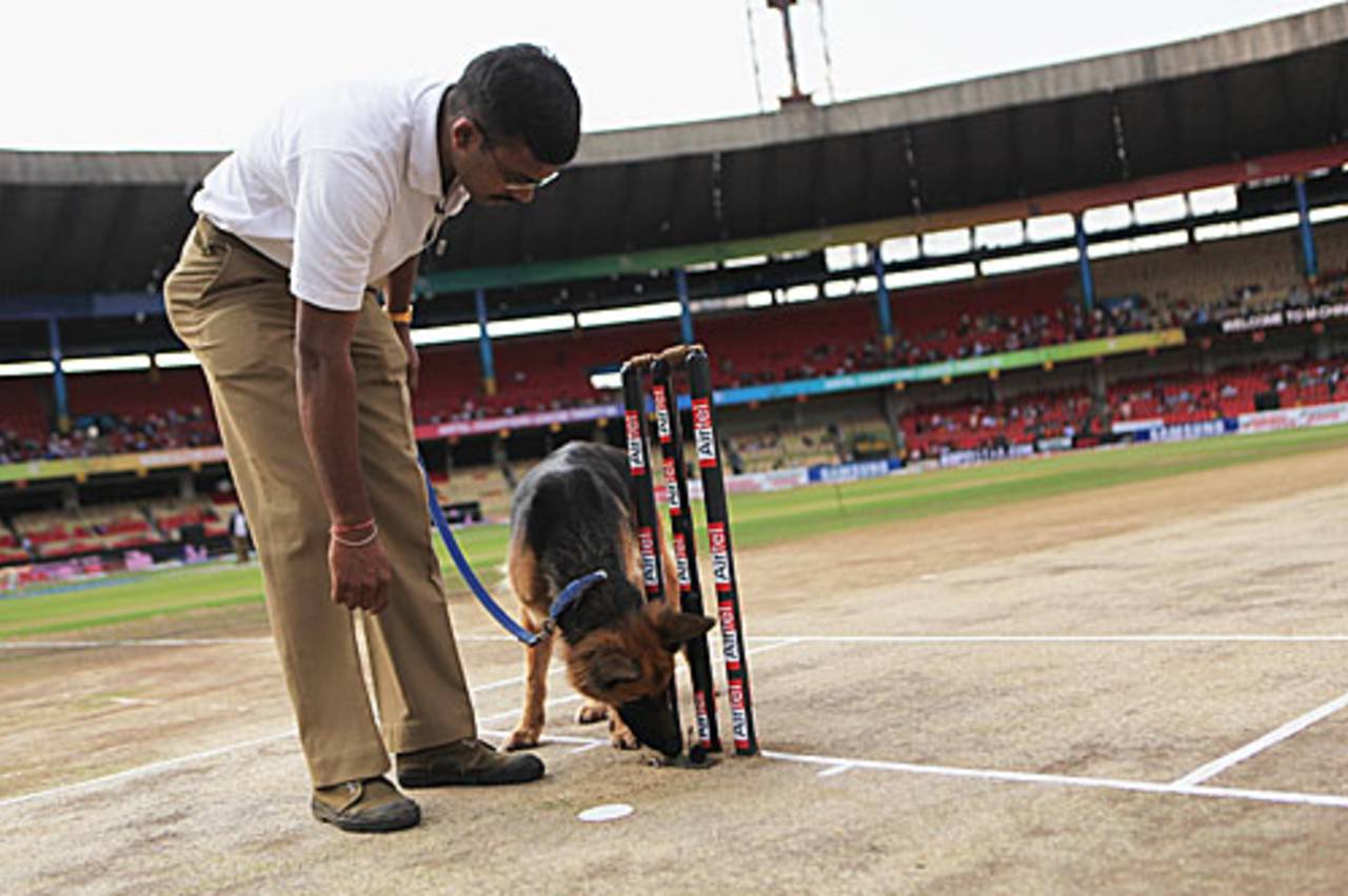 A sniffer dog is busy at work at the Chinnaswamy Stadium, Cape Cobras v Victoria, Champions League Twenty20, League B, Bangalore, October 17, 2009 