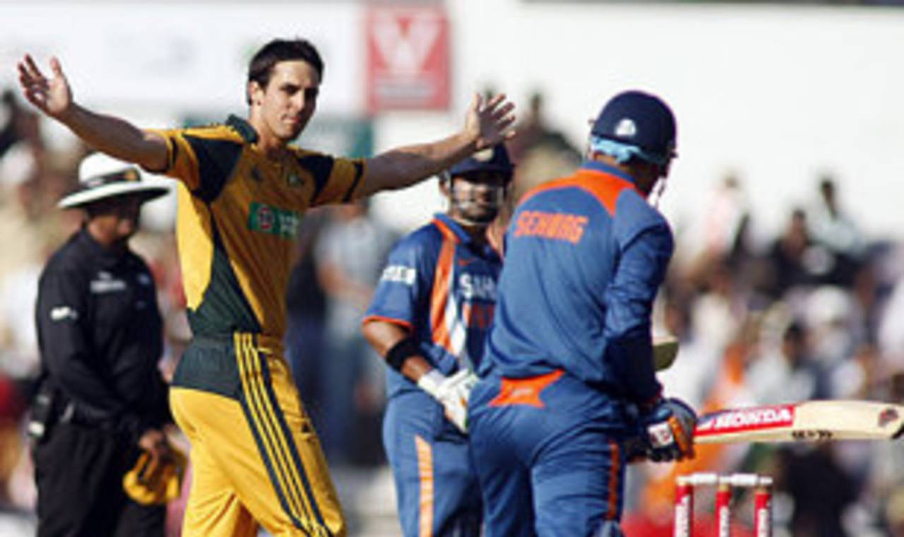 Mitchell Johnson gestures to Virender Sehwag, India v Australia, 2nd ODI, Nagpur, October 28, 2009